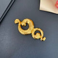 YSL Sculpted Spiral Gold Statement Brooch